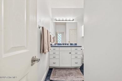 Nestled on the golf course in the gated community of Seven Lakes on Beacon Ridge Golf and Country Club in North Carolina - for sale on GolfHomes.com, golf home, golf lot