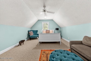 Nestled on the golf course in the gated community of Seven Lakes on Beacon Ridge Golf and Country Club in North Carolina - for sale on GolfHomes.com, golf home, golf lot