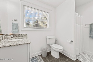 Nestled on the golf course in the gated community of Seven Lakes on Beacon Ridge Golf and Country Club in North Carolina - for sale on GolfHomes.com, golf home, golf lot