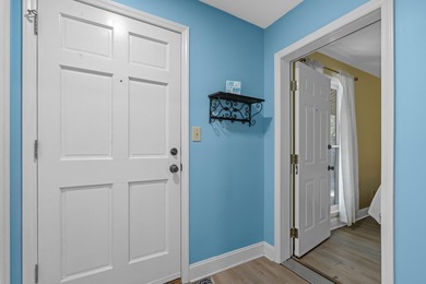 Tucked inside the gated, tree-lined entrance of Pawleys on Pawleys Plantation Golf and Country Club in South Carolina - for sale on GolfHomes.com, golf home, golf lot