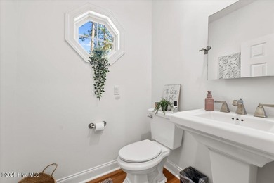 Nestled on the golf course in the gated community of Seven Lakes on Beacon Ridge Golf and Country Club in North Carolina - for sale on GolfHomes.com, golf home, golf lot