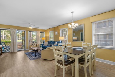 Tucked inside the gated, tree-lined entrance of Pawleys on Pawleys Plantation Golf and Country Club in South Carolina - for sale on GolfHomes.com, golf home, golf lot