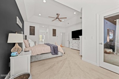 Nestled on the golf course in the gated community of Seven Lakes on Beacon Ridge Golf and Country Club in North Carolina - for sale on GolfHomes.com, golf home, golf lot