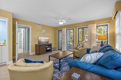 Tucked inside the gated, tree-lined entrance of Pawleys on Pawleys Plantation Golf and Country Club in South Carolina - for sale on GolfHomes.com, golf home, golf lot