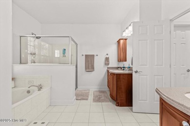 Nestled on the golf course in the gated community of Seven Lakes on Beacon Ridge Golf and Country Club in North Carolina - for sale on GolfHomes.com, golf home, golf lot