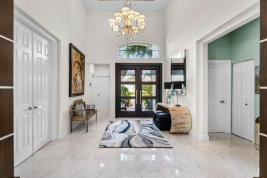 Discover luxury living in BallenIsles Country Club with a golf on BallenIsles Golf and Country Club in Florida - for sale on GolfHomes.com, golf home, golf lot