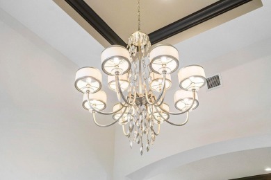 Discover luxury living in BallenIsles Country Club with a golf on BallenIsles Golf and Country Club in Florida - for sale on GolfHomes.com, golf home, golf lot