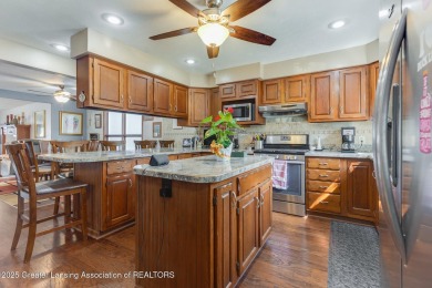 Welcome to 1551 Charlotte Landing in Springport, a charming on Duck Lake Country Club in Michigan - for sale on GolfHomes.com, golf home, golf lot