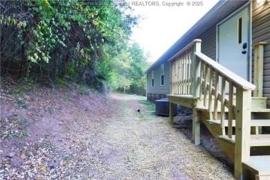 Enjoy scenic views of Edgewood Country Club from this on Edgewood Country Club in West Virginia - for sale on GolfHomes.com, golf home, golf lot