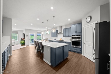 Welcome to this pristine 2-bedroom, 2-bath home with stunning on Quail Hollow Resort and Country Club in Ohio - for sale on GolfHomes.com, golf home, golf lot