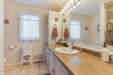 Welcome to 1551 Charlotte Landing in Springport, a charming on Duck Lake Country Club in Michigan - for sale on GolfHomes.com, golf home, golf lot