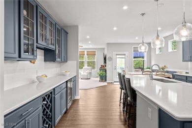 Welcome to this pristine 2-bedroom, 2-bath home with stunning on Quail Hollow Resort and Country Club in Ohio - for sale on GolfHomes.com, golf home, golf lot