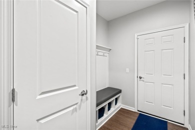 Welcome to this pristine 2-bedroom, 2-bath home with stunning on Quail Hollow Resort and Country Club in Ohio - for sale on GolfHomes.com, golf home, golf lot