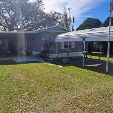 NEW LOW PRICE!!  GREAT VALUE!!  Located in an all age RV resort on Southport Springs Golf Club in Florida - for sale on GolfHomes.com, golf home, golf lot