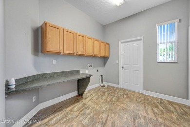 Discover the perfect blend of space, style, and location in this on Crane Creek Reserve Golf Club in Florida - for sale on GolfHomes.com, golf home, golf lot