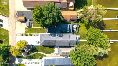 Welcome to 1551 Charlotte Landing in Springport, a charming on Duck Lake Country Club in Michigan - for sale on GolfHomes.com, golf home, golf lot