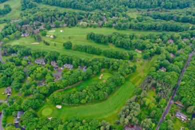 This elegant home is beautifully nestled on 1.5 acres high on on Buck Hill Golf Club  in Pennsylvania - for sale on GolfHomes.com, golf home, golf lot