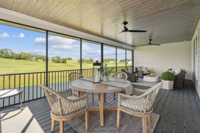 This 2024 Parade of Homes by Hodge Construction overlooks the on Saddleback Ridge Golf Course in Iowa - for sale on GolfHomes.com, golf home, golf lot