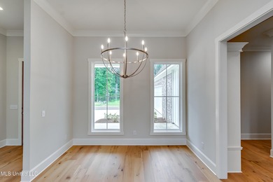 Welcome to 122 Grayson Way in Lake Caroline -- a beautifully on Lake Caroline Golf Club in Mississippi - for sale on GolfHomes.com, golf home, golf lot