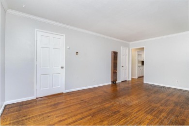 Cute three bedroom one bath brick home blocks from Stevens Park on Stevens Park Golf Course in Texas - for sale on GolfHomes.com, golf home, golf lot