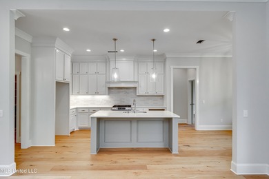 Welcome to 122 Grayson Way in Lake Caroline -- a beautifully on Lake Caroline Golf Club in Mississippi - for sale on GolfHomes.com, golf home, golf lot