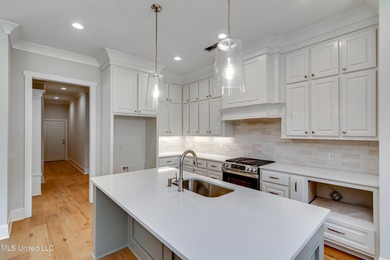 Welcome to 122 Grayson Way in Lake Caroline -- a beautifully on Lake Caroline Golf Club in Mississippi - for sale on GolfHomes.com, golf home, golf lot