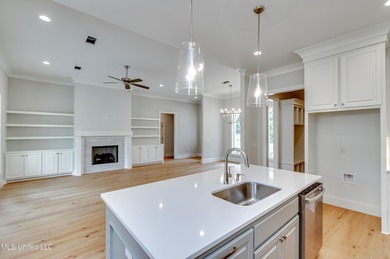 Welcome to 122 Grayson Way in Lake Caroline -- a beautifully on Lake Caroline Golf Club in Mississippi - for sale on GolfHomes.com, golf home, golf lot