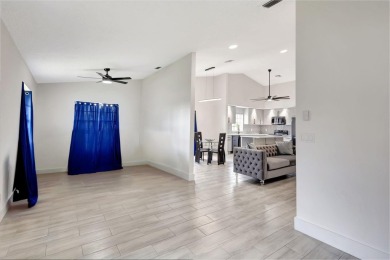 Fully updated and never lived in, this stunning 2-bedroom on Cypress Lakes Golf Course - West Palm Beach in Florida - for sale on GolfHomes.com, golf home, golf lot