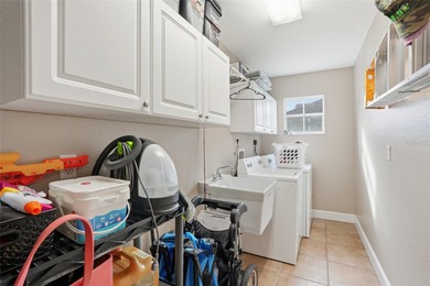 Welcome to this beautiful 3-bedroom, 2-bath, 2-car garage pool on Deep Creek Golf Club in Florida - for sale on GolfHomes.com, golf home, golf lot