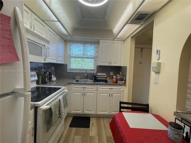 Beautiful 2/2 ready to move in condo located in the desirable on Sunrise Lakes Phase IV Golf Course in Florida - for sale on GolfHomes.com, golf home, golf lot