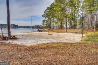 Beautiful lot with seasonal water views of Jackson Lake! on Turtle Cove Golf Course in Georgia - for sale on GolfHomes.com, golf home, golf lot