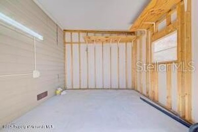 Welcome to your dream abode, nestled on a desirable corner lot on Brookridge Country Club in Florida - for sale on GolfHomes.com, golf home, golf lot