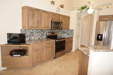 Impressive WATERFRONT home on an oversized lot in desirable deed on Twin Isles Country Club in Florida - for sale on GolfHomes.com, golf home, golf lot