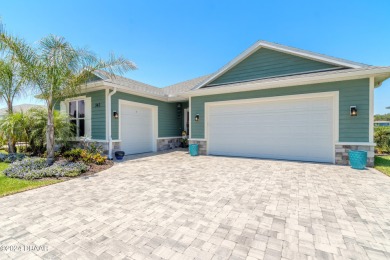 This exquisite Venetian Bay home offers a spacious lot on Venetian Bay Golf Course in Florida - for sale on GolfHomes.com, golf home, golf lot