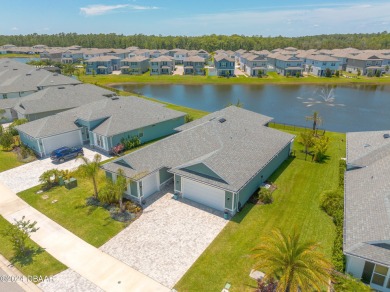 This exquisite Venetian Bay home offers a spacious lot on Venetian Bay Golf Course in Florida - for sale on GolfHomes.com, golf home, golf lot