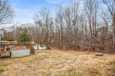 Fantastic opportunity to own this three-bedroom, two-bath home on Reynolds Park Golf Course in North Carolina - for sale on GolfHomes.com, golf home, golf lot