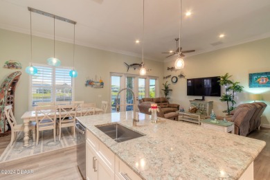 This exquisite Venetian Bay home offers a spacious lot on Venetian Bay Golf Course in Florida - for sale on GolfHomes.com, golf home, golf lot