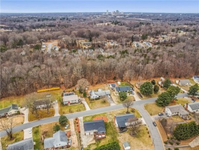 Fantastic opportunity to own this three-bedroom, two-bath home on Reynolds Park Golf Course in North Carolina - for sale on GolfHomes.com, golf home, golf lot