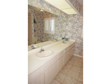 Impressive WATERFRONT home on an oversized lot in desirable deed on Twin Isles Country Club in Florida - for sale on GolfHomes.com, golf home, golf lot