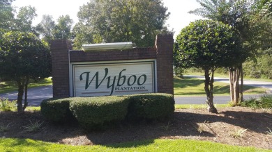 Welcome to 113 Ridge Lake Drive, where every day feels like a on Players Course At Wyboo Plantation in South Carolina - for sale on GolfHomes.com, golf home, golf lot