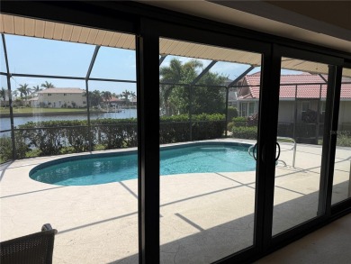 Impressive WATERFRONT home on an oversized lot in desirable deed on Twin Isles Country Club in Florida - for sale on GolfHomes.com, golf home, golf lot