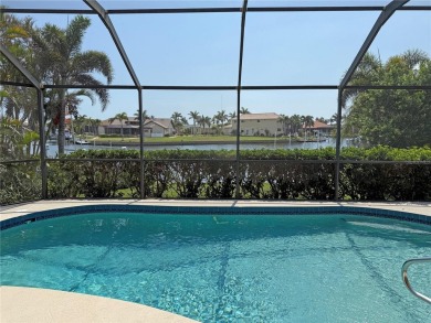 Impressive WATERFRONT home on an oversized lot in desirable deed on Twin Isles Country Club in Florida - for sale on GolfHomes.com, golf home, golf lot