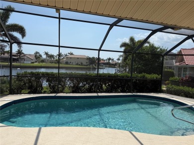 Impressive WATERFRONT home on an oversized lot in desirable deed on Twin Isles Country Club in Florida - for sale on GolfHomes.com, golf home, golf lot