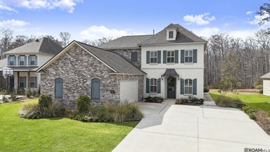 Classic architectural charm meets refined comfort in this on Carter Plantation Golf Course in Louisiana - for sale on GolfHomes.com, golf home, golf lot