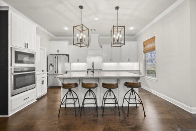 Classic architectural charm meets refined comfort in this on Carter Plantation Golf Course in Louisiana - for sale on GolfHomes.com, golf home, golf lot