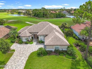 Immaculate concrete block home with high and coffered ceilings on Marsh Creek Country Club in Florida - for sale on GolfHomes.com, golf home, golf lot