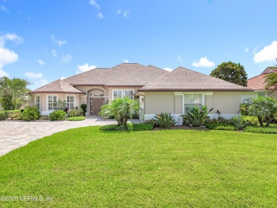 Immaculate concrete block home with high and coffered ceilings on Marsh Creek Country Club in Florida - for sale on GolfHomes.com, golf home, golf lot