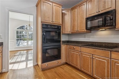 Nestled on a 1.2-acre cul-de-sac lot in Stonehouse, this 2817 sq on The Tradition Golf Club At Stonehouse in Virginia - for sale on GolfHomes.com, golf home, golf lot