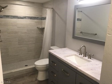 First-floor end unit in desirable Cross Creek Country Club - no on Cross Creek Country Club in Florida - for sale on GolfHomes.com, golf home, golf lot