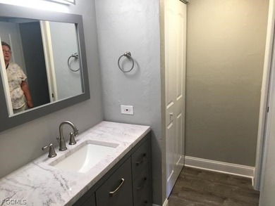 First-floor end unit in desirable Cross Creek Country Club - no on Cross Creek Country Club in Florida - for sale on GolfHomes.com, golf home, golf lot